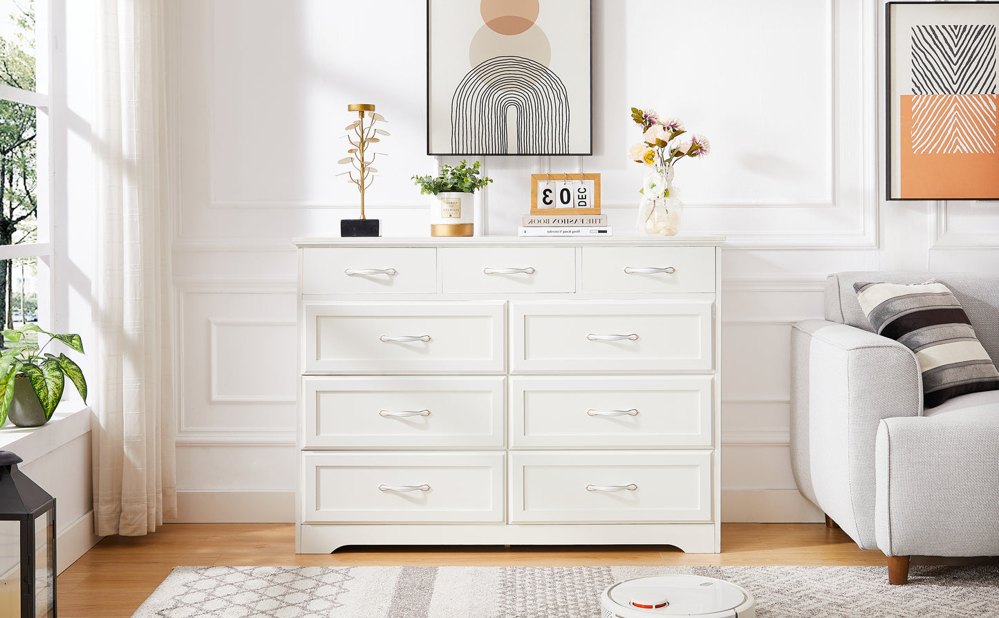 White wooden dresser with 9 drawers