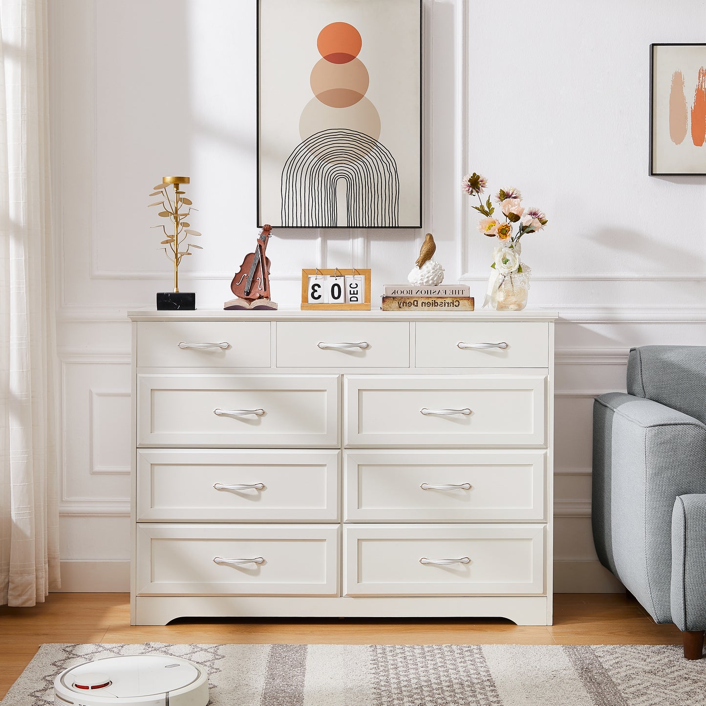 White wooden dresser with 9 drawers